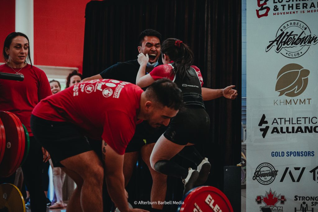 Alicia Cheung competing at the Band of Barbells Classic Powerlifting Competition
