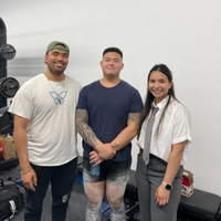 Maria with athletes, Nick and Jason after a powerlifting competition
