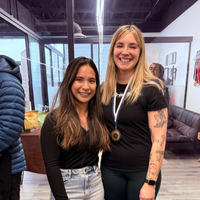 Maria with one of her athletes, Halley, after her competition
