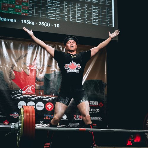 Cam Li winning 66 kg. national title in the Canadian powerlifting competition