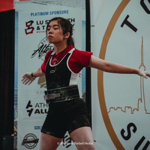 Alicia Cheung competing at the Band of Barbells Classic Powerlifting Competition