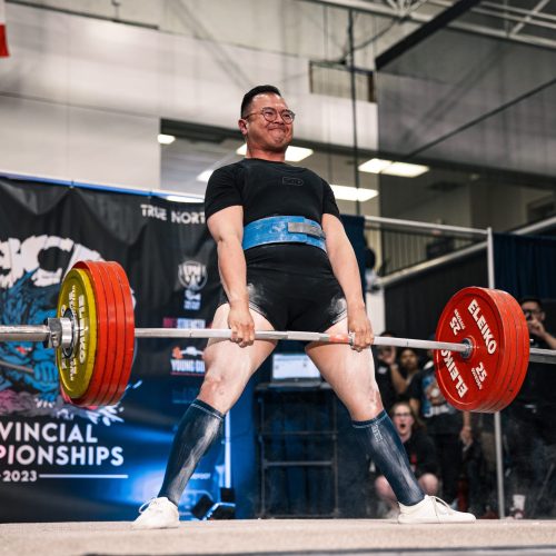 Greg deadlifting at a powerlifting competition
